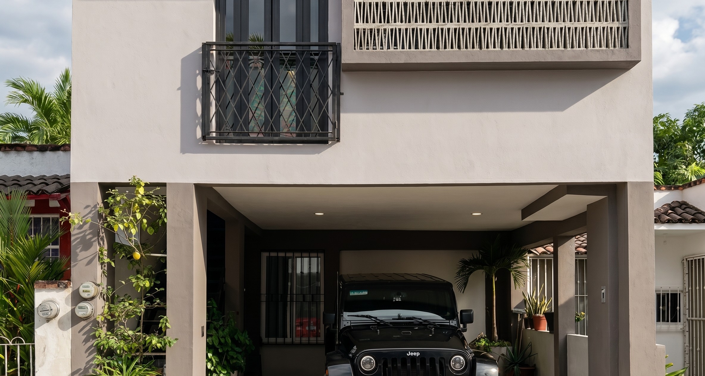 Casa Manglar — fachada bifamiliar con celosía artesanal de concreto, Puerto Vallarta